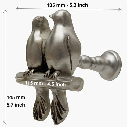 Wall mounted curtain tie back two birds on a branch. Designed as two large birds on a branch looking each other.